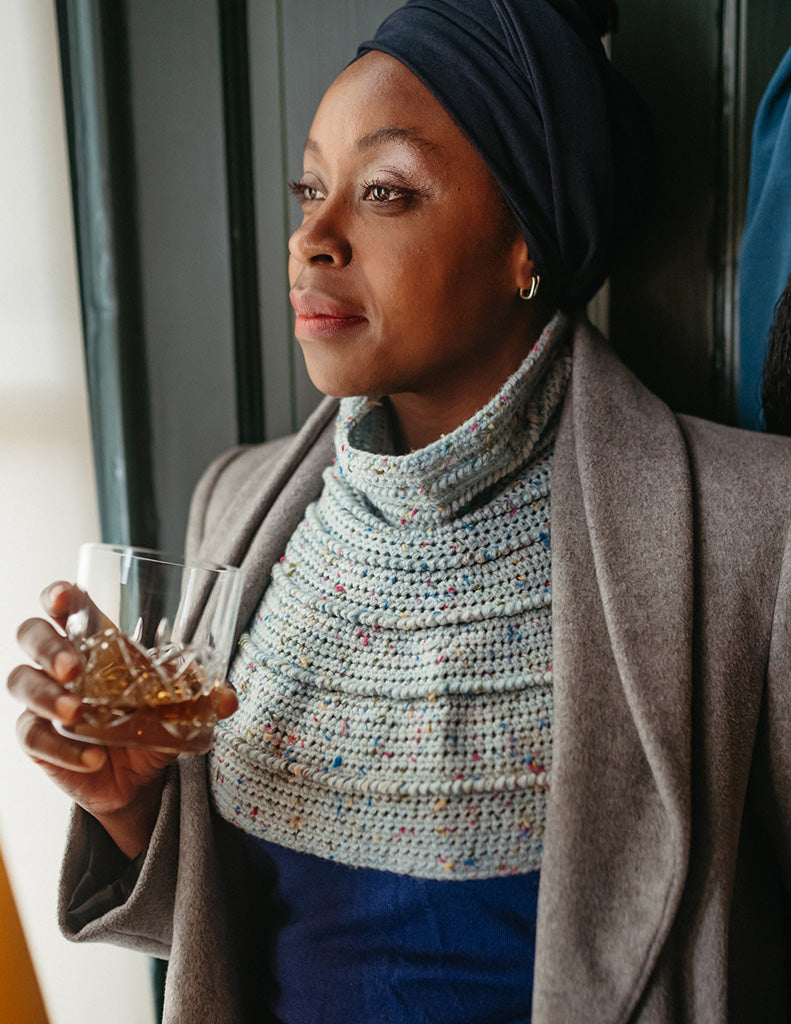 Solwind is a shaped cowl that can be worn easily under a coat. It fits close to the neck, then increases to sit on the shoulders like a sweater yoke.